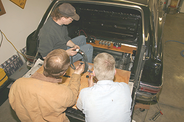 Compressor installed in wagon trunk